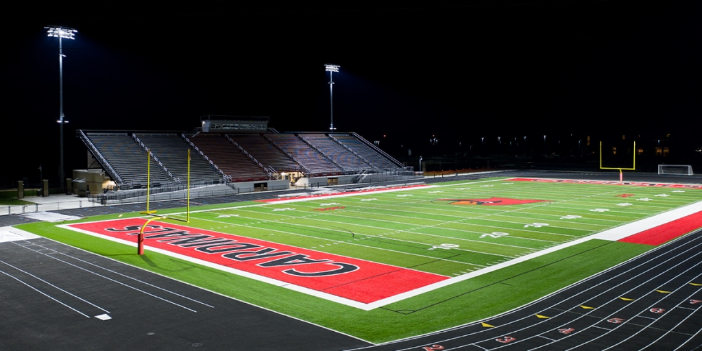 George Rodgers Clark football field with Musco custom LED sports lighting system in the background
