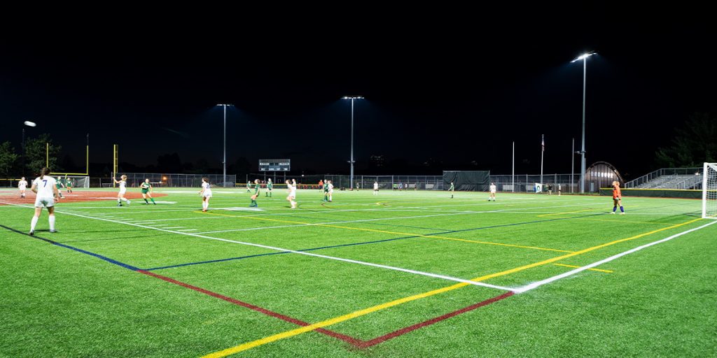 High school soccer game being played at night under Musco Musco’s TLC for LED® retrofit lighting