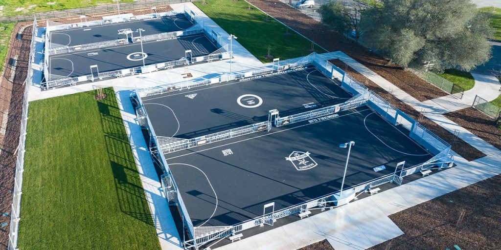 Four-court mini-pitch soccer complex with remote operable TLC for LED lights and ADA-complaint access located in Charles Robertson Park