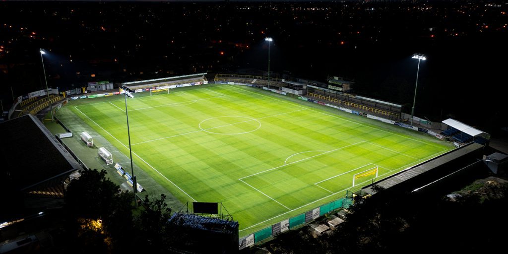 Night photo of Sutton United Football Club updates stadium lighting to musco's