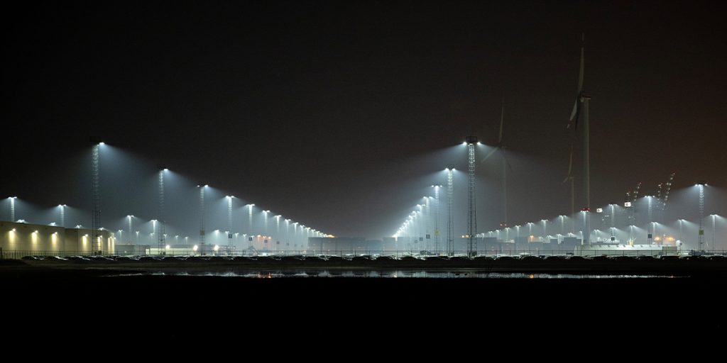 Musco's patented fixture visoring directs light where it's needed on the port, increases worker safety while eliminating spill and glare to the neighboring nature preserve at Antwerp Terminals.