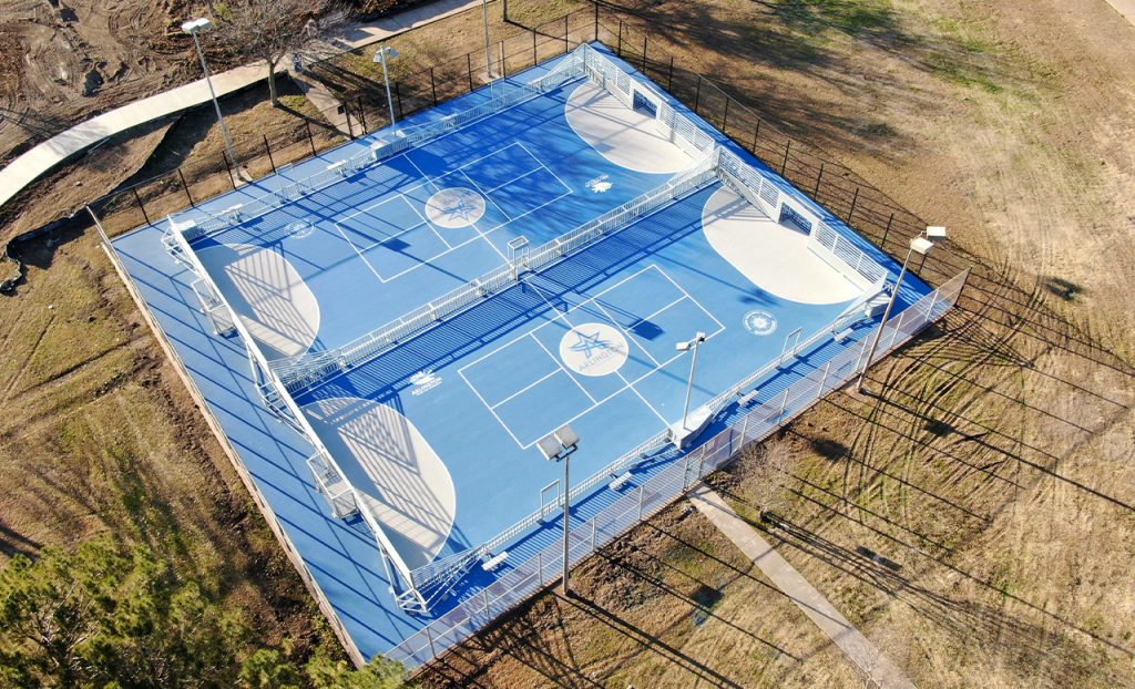 Pickleball mini-pitch at Bob Cooke Park with blue and gray surface.