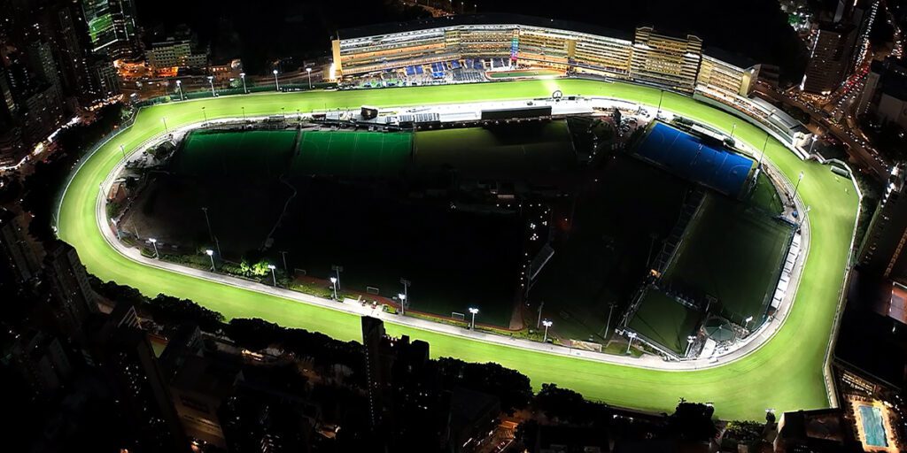 Overhead view of the horse track at Happy Valley Racecourse after being lit with new LED track lights