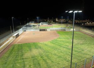 Baseball field with new LED pole and fixture in the foreground at Judy Nelson Elementary School