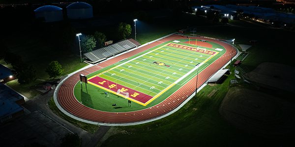 Football field at Hazelwood East High School lit at night