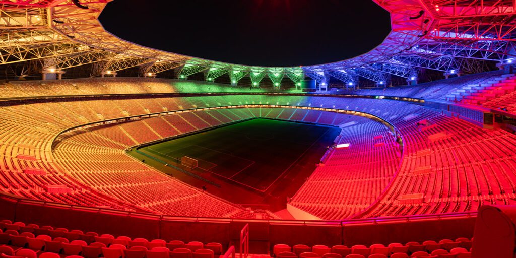King Abdullah Stadium transforms into a jewelry box of color, lighting stands in vibrant green, blue, red and yellow with new LED light show technology.