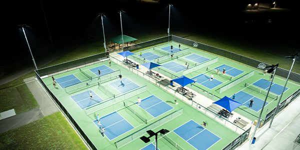 Savage, Minnesota residents play under new LED pickleball lights at Community Park.